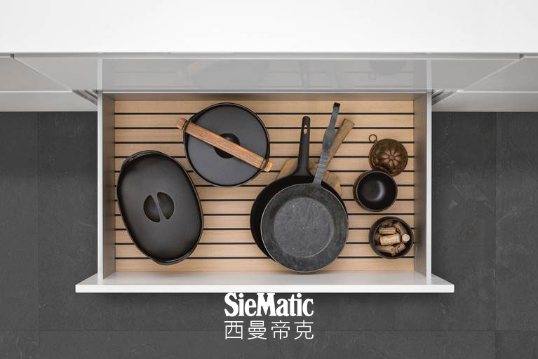 GripDeck inserts for SieMatic kitchen drawers and pull-outs prevent pots and pans from sliding.